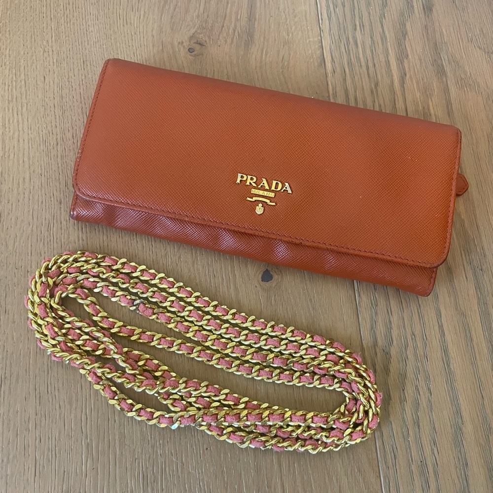 Orange prada wallet with optional chain to make into bag